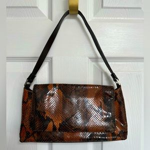 Kenneth Cole New York animal print shoulder bag. Trending now animal print!